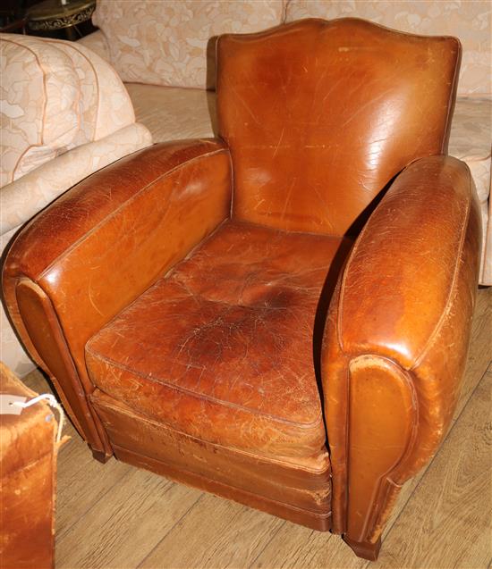 A 1940s French tan leather club armchair, W. approx. 89cm H.78cm L.96cm